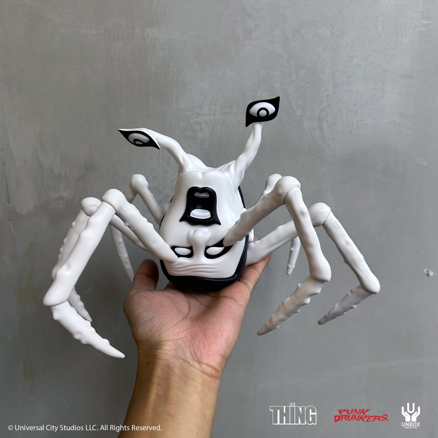 THE THING: PDS AITSU CHASE VARIANT HEAD - Preorder, a white vinyl art-figure with eight legs and eyestalks, inspired by The Thing.
