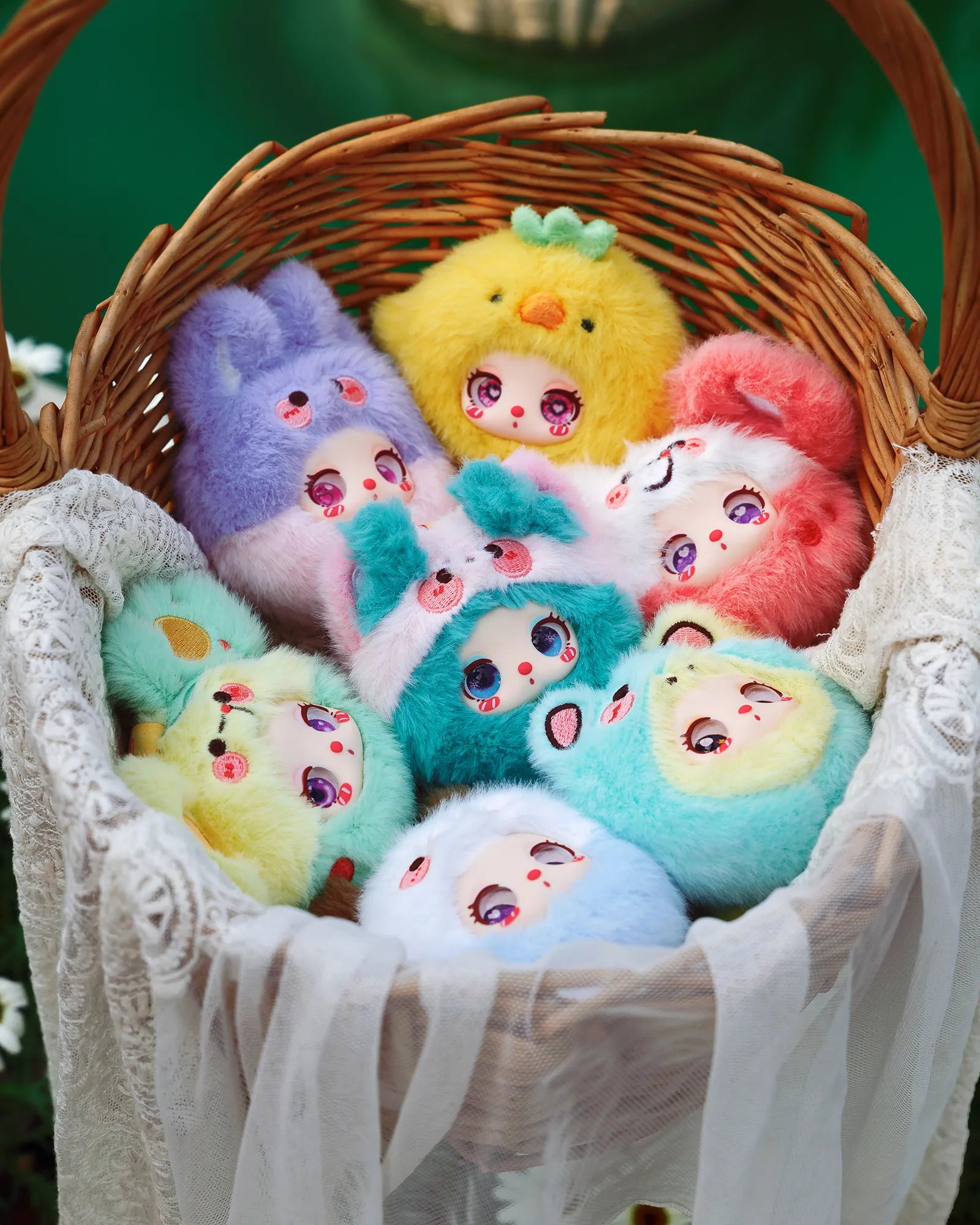 Liila’s Garden Tea Party Mini Plush Blind Box: Woven basket filled with pastel plushies featuring anime eyes, animal ears, offering 6 designs, plus one secret option.