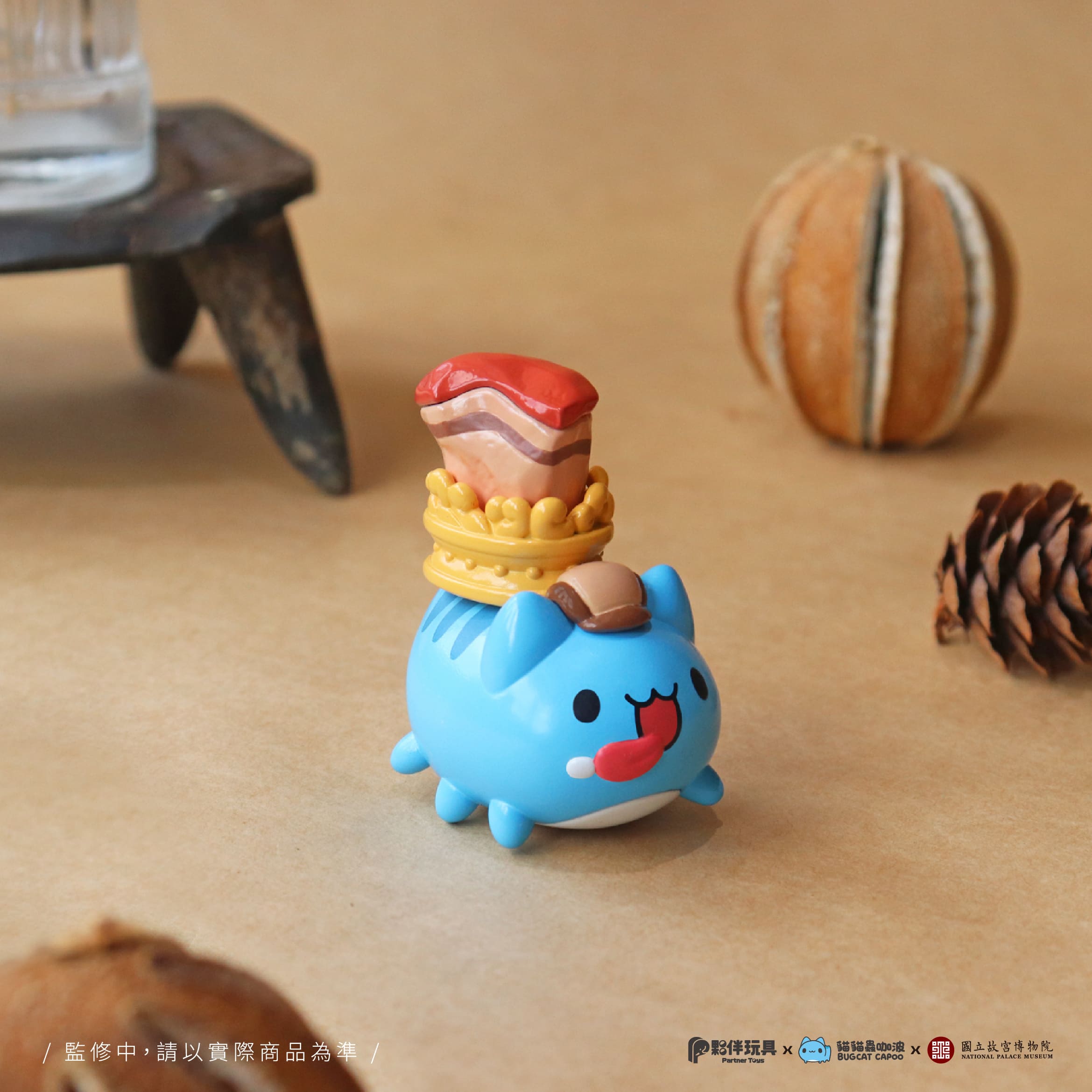 Bugcat Capoo figurine with crown, part of National Palace Museum Adventure blind box series. Surrounded by gourds, pinecones, highlighting Strangecat Toys' art toy selection.