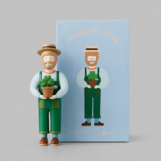 CBB - Forestman Clover Tree: A PVC toy figurine of a man holding a potted clover, measuring 70 x 55 x 195 mm, made in China.