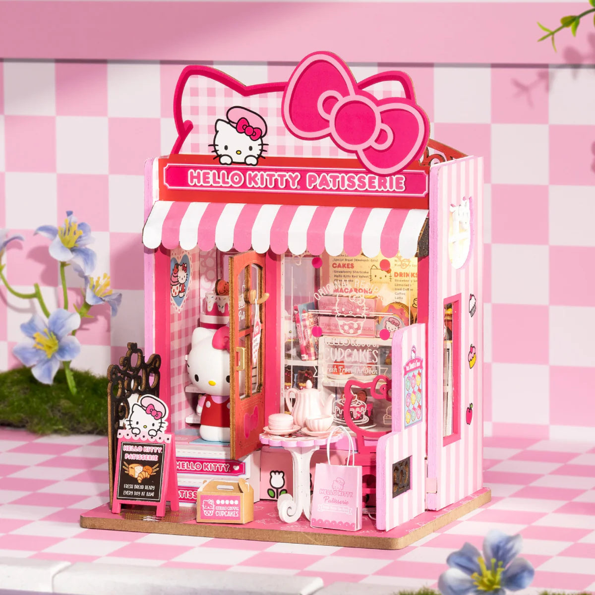 Hello Kitty Patisserie miniature showcases a detailed bakery scene with tiny pastries, a Hello Kitty figure, and LED lighting, perfect for collectors or display.