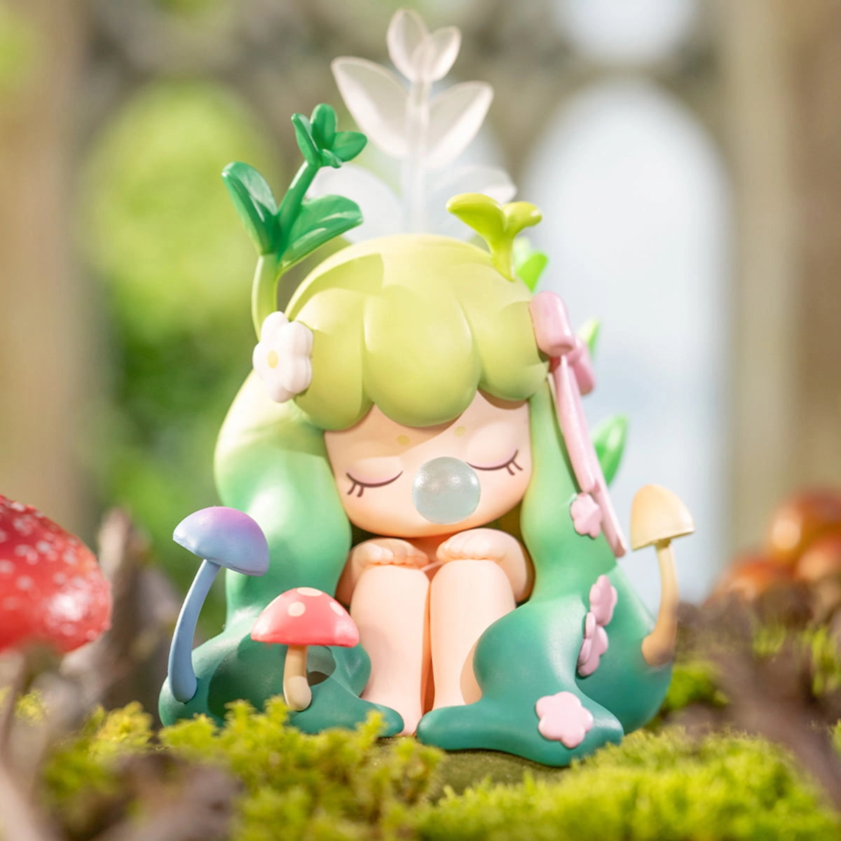 Nanci's Museum of Fantasy Blind Box Series figurine, a forest sprite with green hair and mushrooms, blowing a bubble, capturing whimsical, nature-themed art toy charm.
