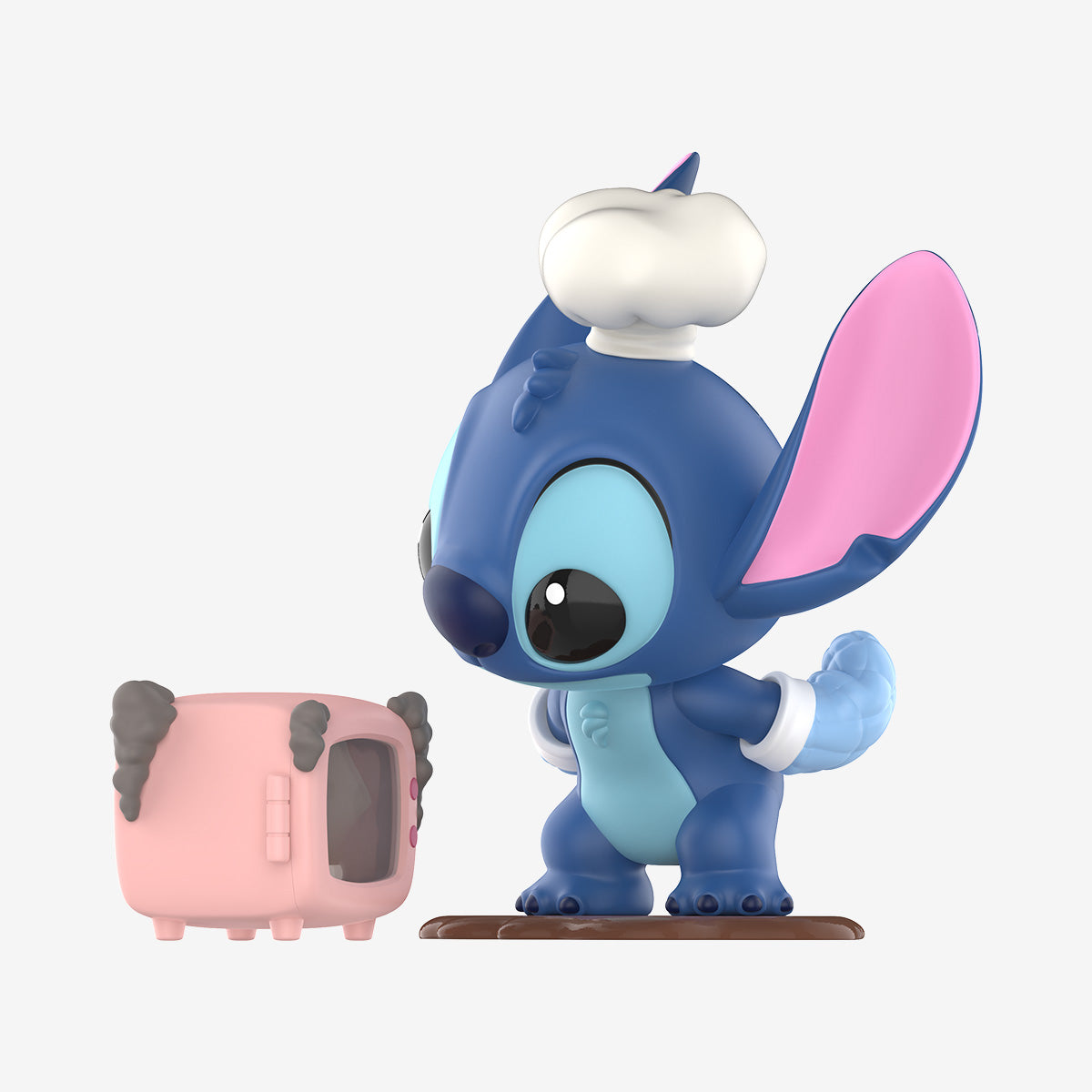 Disney Stitch on a Date Series Figure shows chibi Stitch as a chef with a tiny toaster, part of a collectible preorder set from Strangecat Toys.