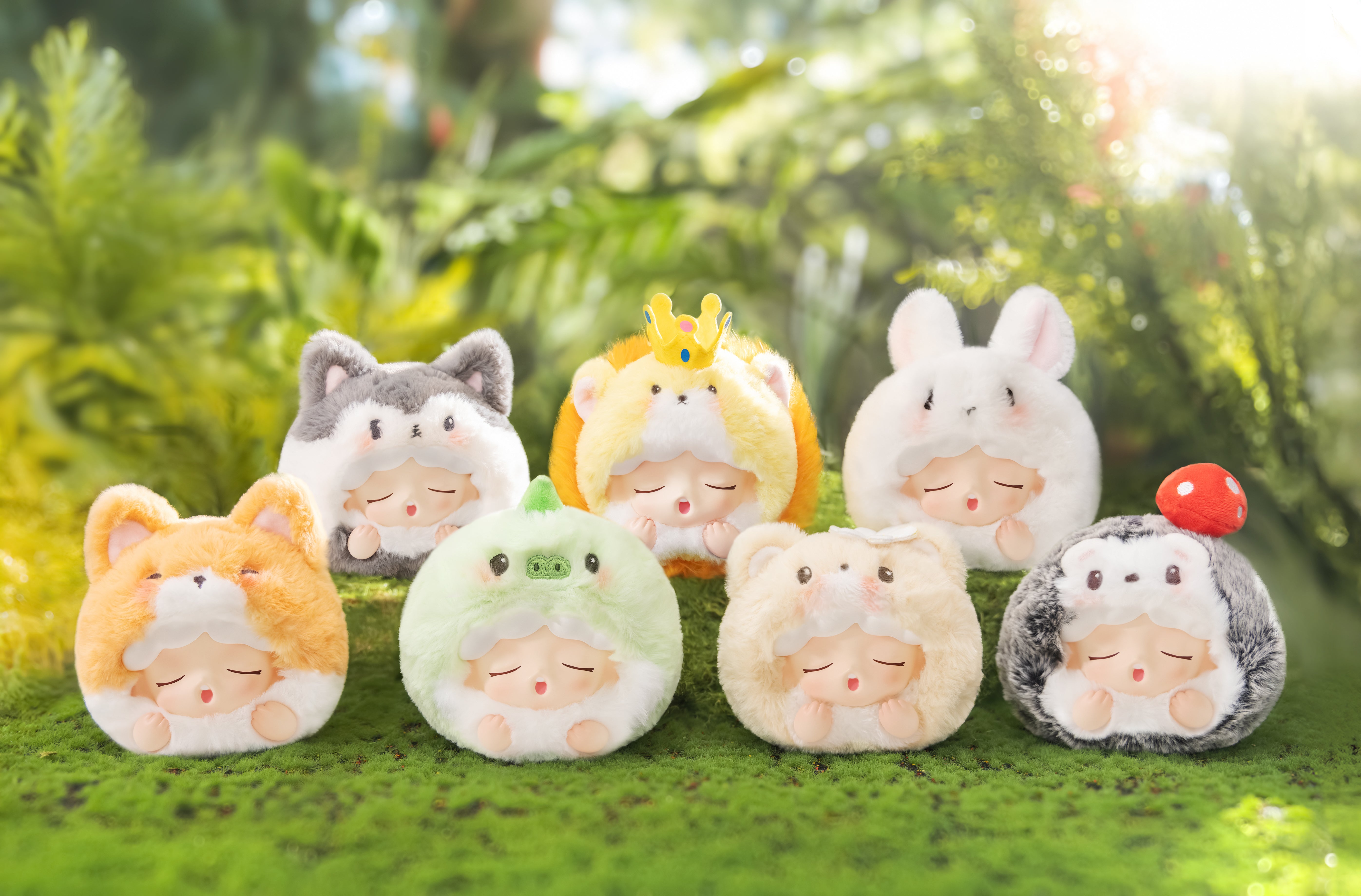 YUMO Forest Friends Series Plush Blind Box featuring various stuffed animals on grass, highlighting whimsical designs from a blind box toy collection.