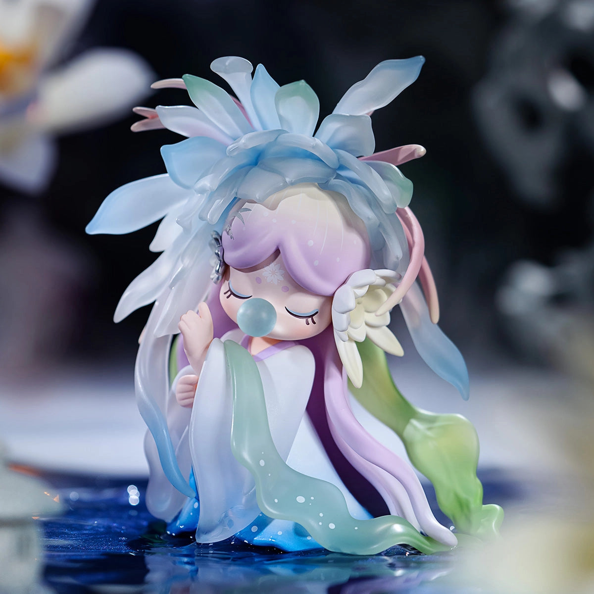 Nanci's Flower Stories Blind Box Series figurine, part of a 12-design collection with a secret variant, ideal for art toy enthusiasts.