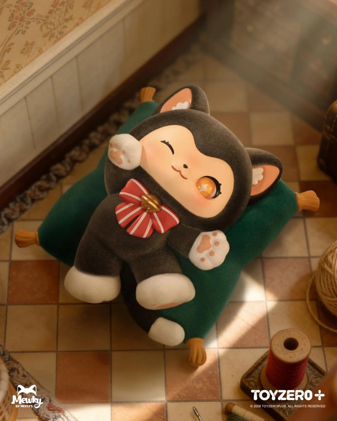 MOFFY'S Magic Tailoring Shop - The Magic Furry Mewky Blind Box plush toy in a cat suit, winking, with sewing props on a green cushion.