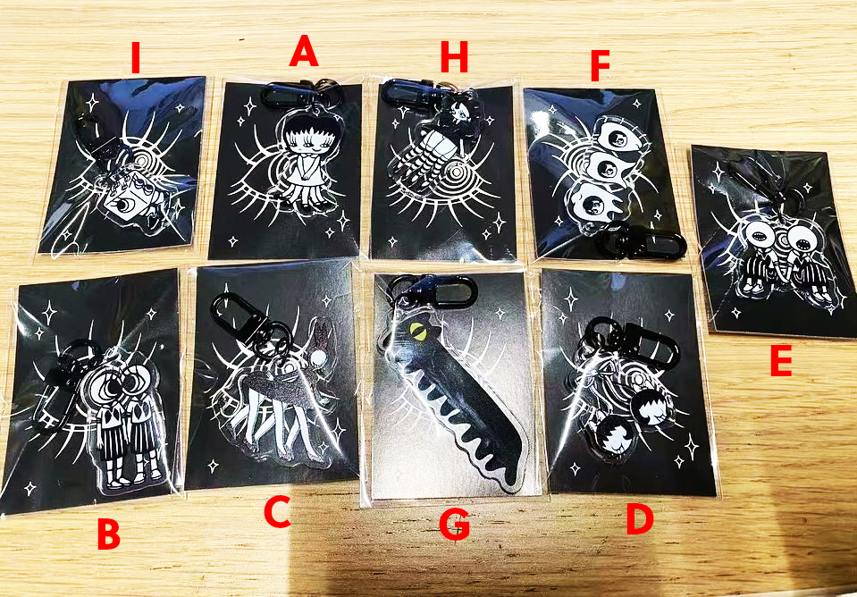 Mini Keychain by Abao, featuring cartoon characters on black plastic bags. Preorder now, shipping in Aug 2024.