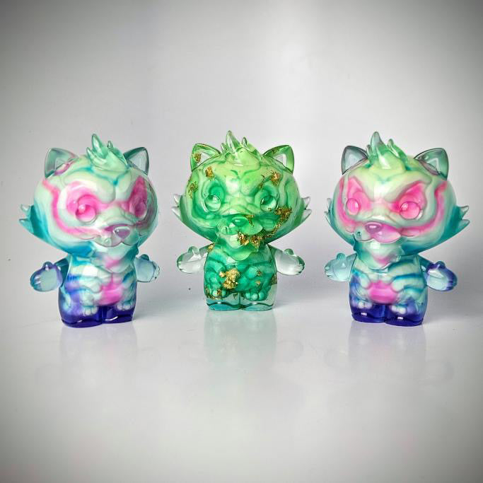 Grandpa by Motley Miscreations: three unique, chubby animal figurines with colorful, translucent designs, embodying the playful art toy style of Strangecat Toys.