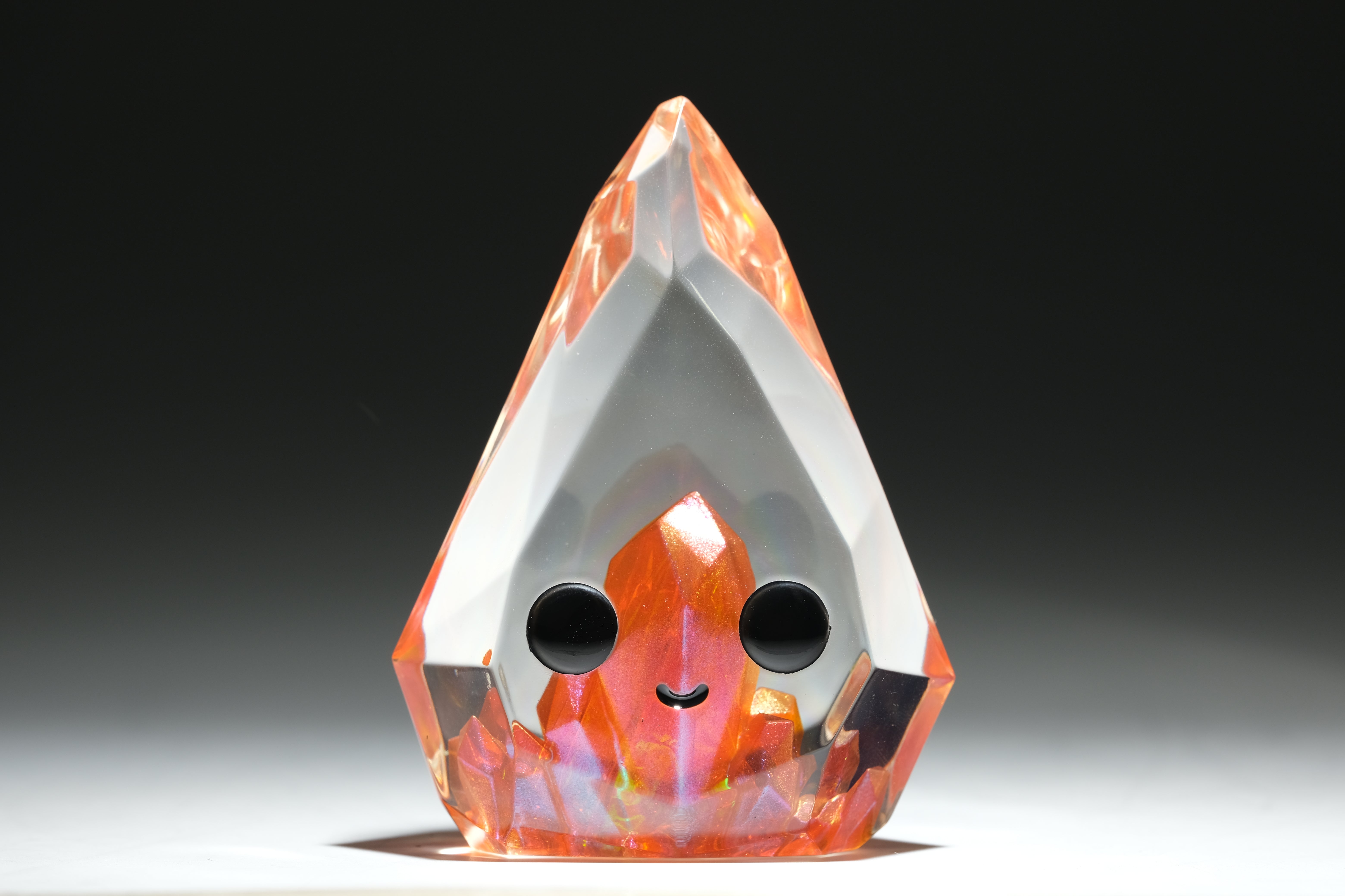 Fire Opal Prismite by Yutoos, a 3.5 resin art piece, edition of 50, featuring a crystalline structure, ideal for collectors of unique art toys.