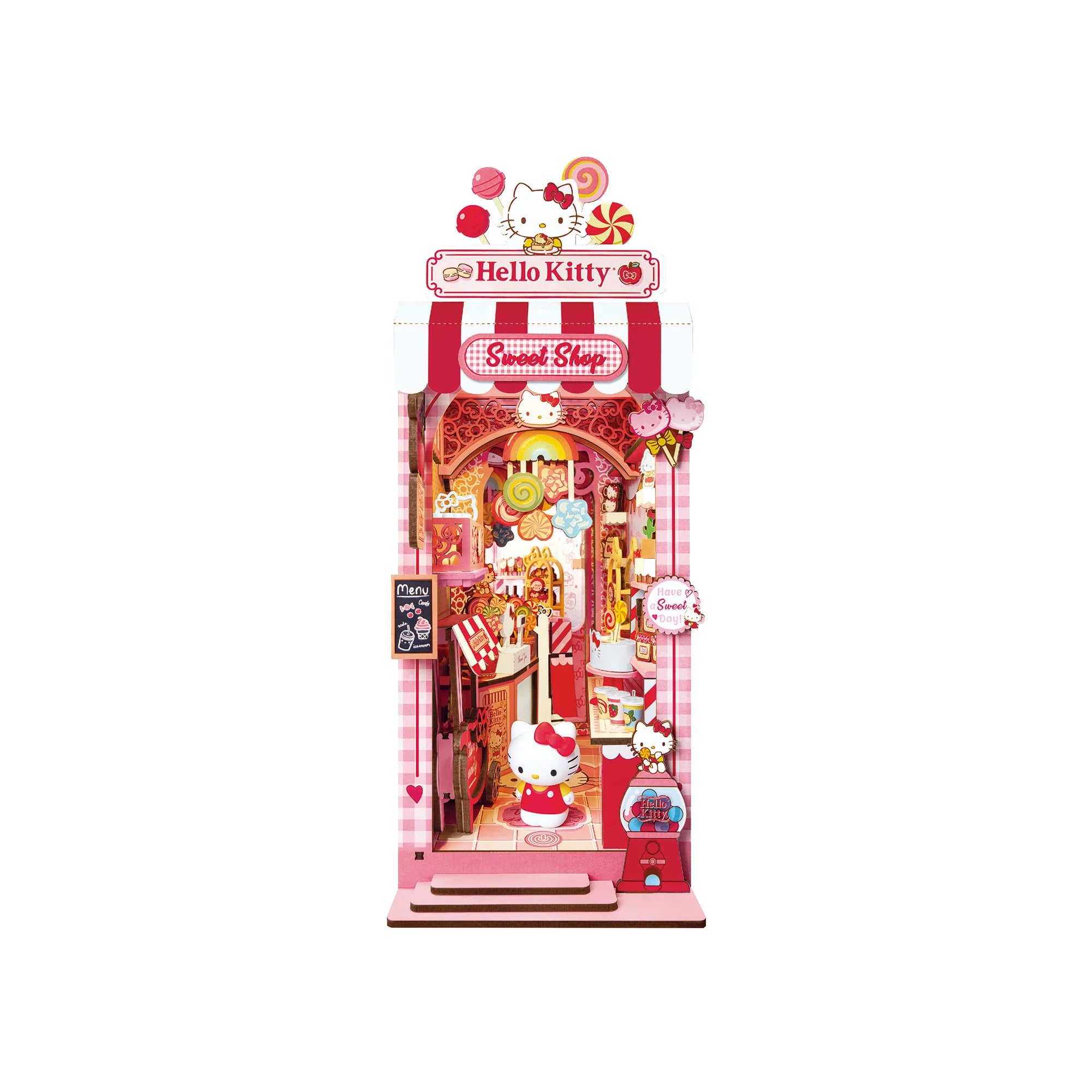 Hello Kitty® Sweet Shop Booknook: A detailed miniature candy store scene with Hello Kitty, lollipop chandelier, and candy-shop details. 149-piece kit for ages 14+.