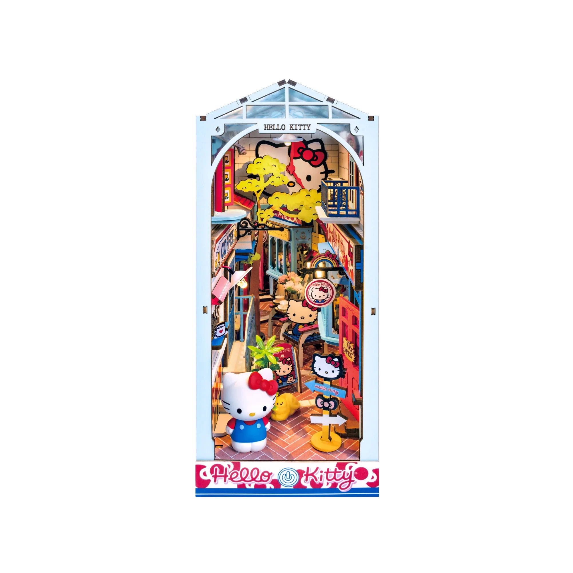 Hello Kitty® Town Square Booknook: miniature diorama with shops, cafés, Hello Kitty figurine, and touch-activated LED lights, capturing a lively, cozy alleyway scene.