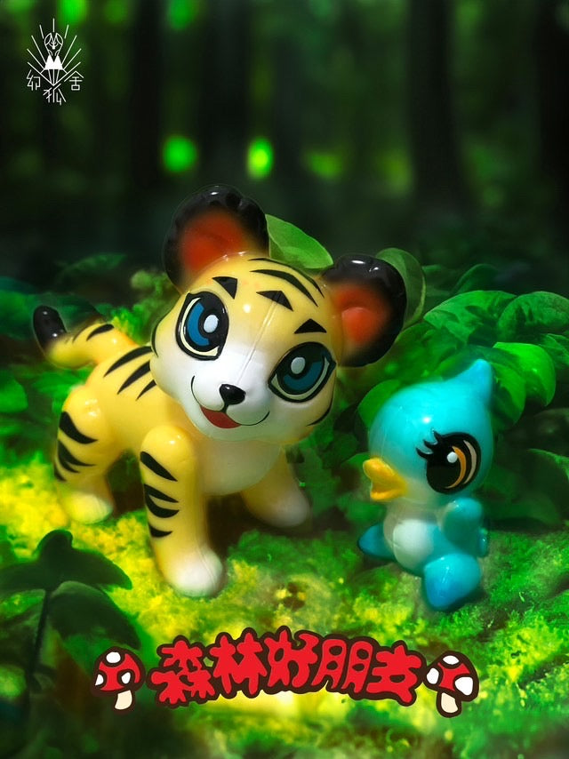 Forest Friends: Tiger and Birdie by Genkosha, a cartoon animal figure toy set in a jungle. Sizes: Tiger 10cm H X 12cm W, Birdie 6cm H X 4cm W.