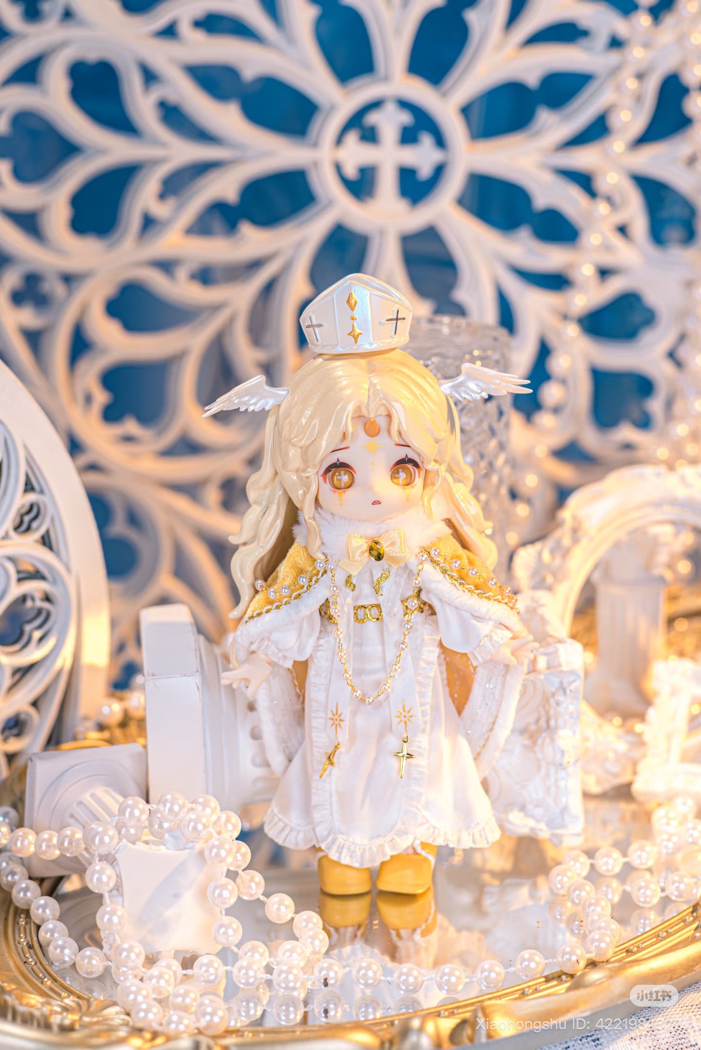 NAGI: The Phantom Record Series Articulated Figure, chibi-style with angelic attire, on mirrored surface with pearls, available for preorder, ships by Nov 2025.