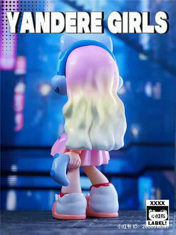 A blind box toy series titled Yandere Girls 2.0 Reject The Label, featuring a toy figure with long hair. Preorder - Ships July 2024.
