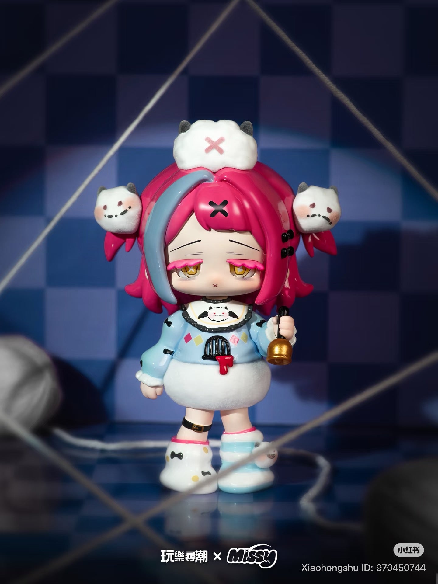 Chibi-style collectible art toy, MISSY: Sweet-Gothic Lolita Crow Paradise, features unique hair and outfit, on checkered surface with yarn accents.