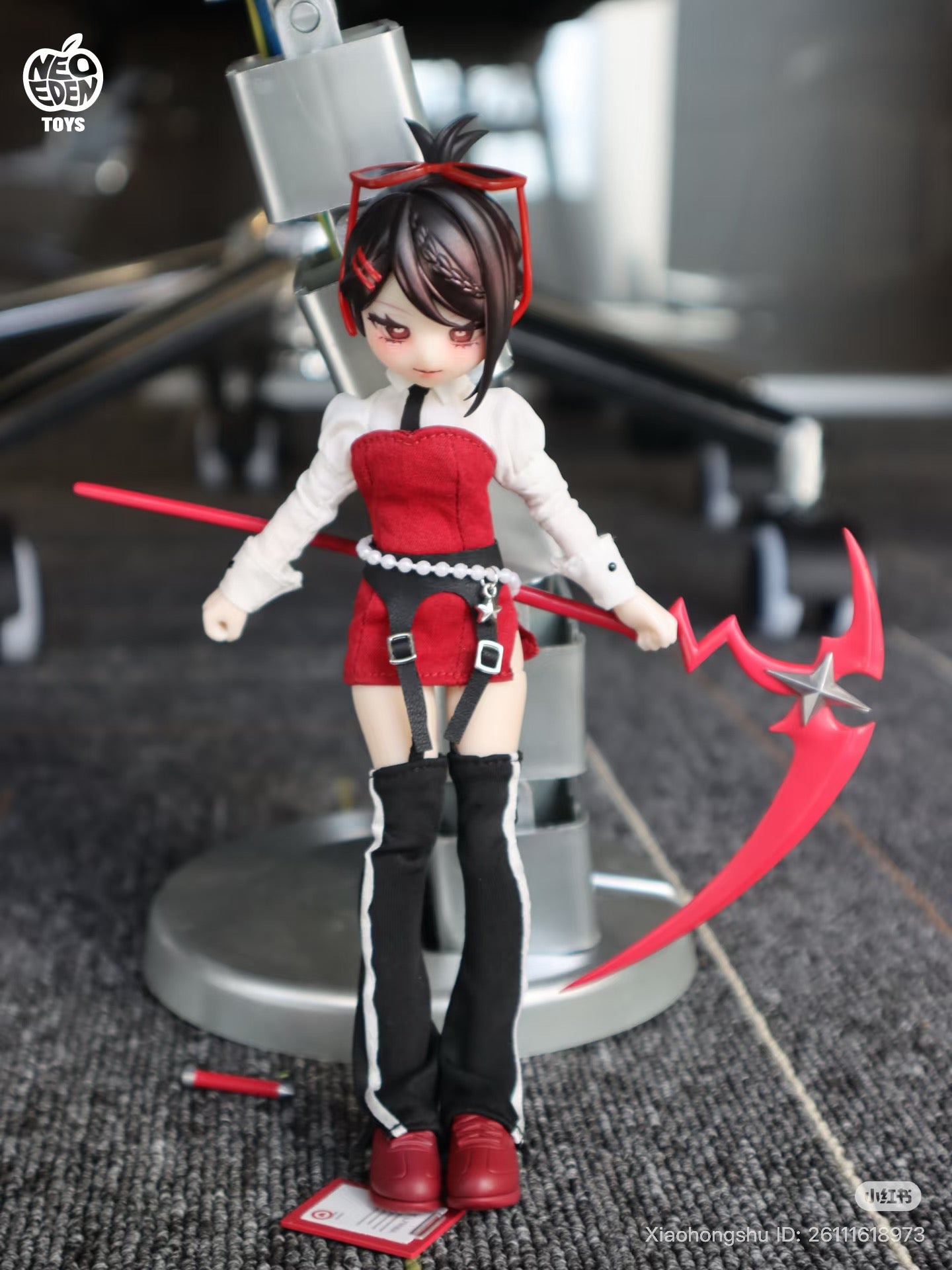 EVE LYNNA II Double Killer Series Action Figure Blind Box, featuring an anime-inspired doll with a red scythe, on display with stand and card.