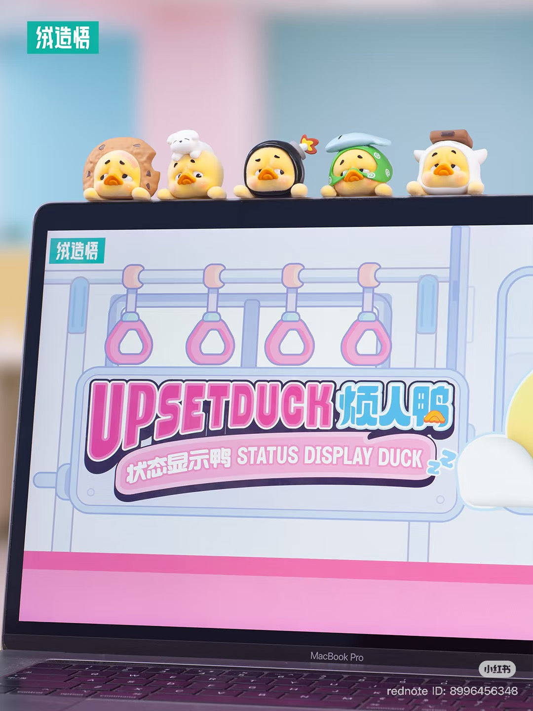 Upsetduck Status Display Duck Blind Box - Preorder: Five duck figurines adorn a MacBook Pro, showcasing playful designs as desktop webcam-top accessories.