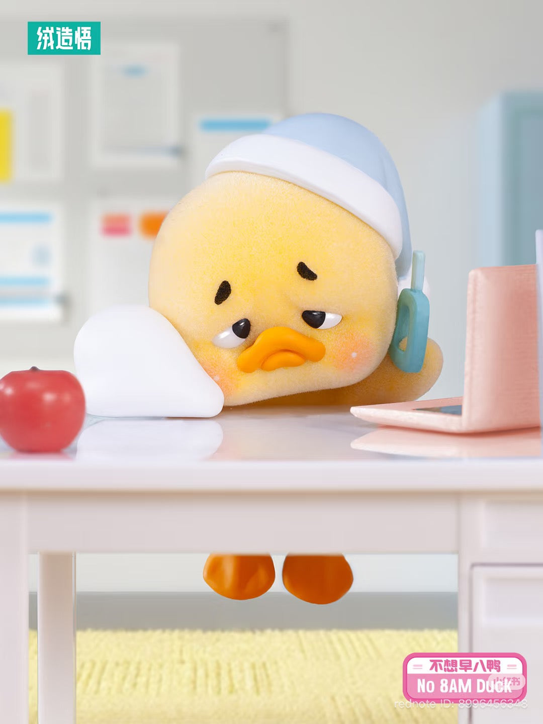 Upsetduck Status Display Duck Blind Box pre-order features a sleepy yellow duck with a blue cap, pink laptop, and apple, capturing a whimsical tiredness.