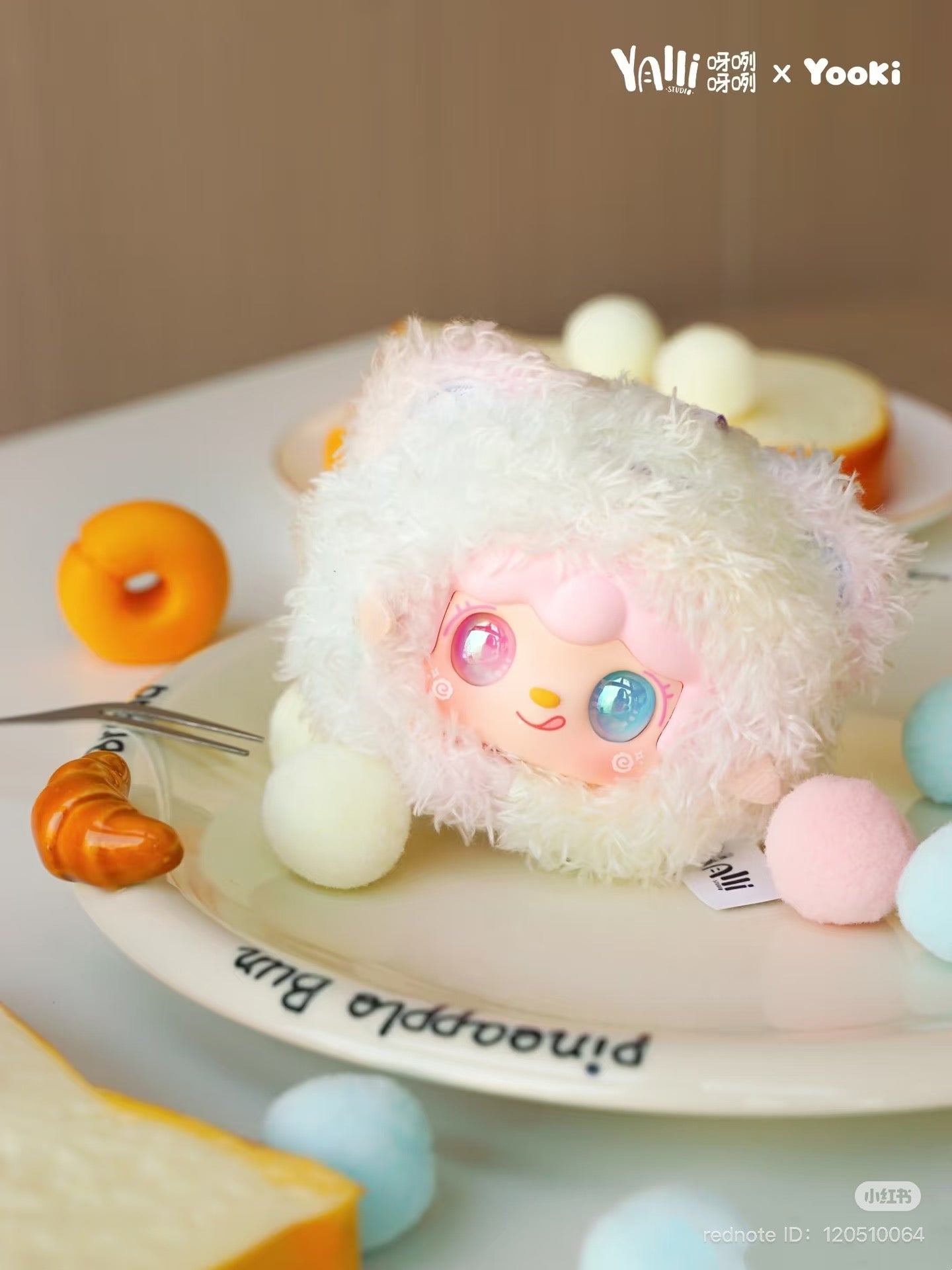 Yooki - Little Bear Bun Mini Keychain Plush Blind Box on a plate, available for preorder at Strangecat Toys, featuring 8 designs and 2 secret options.