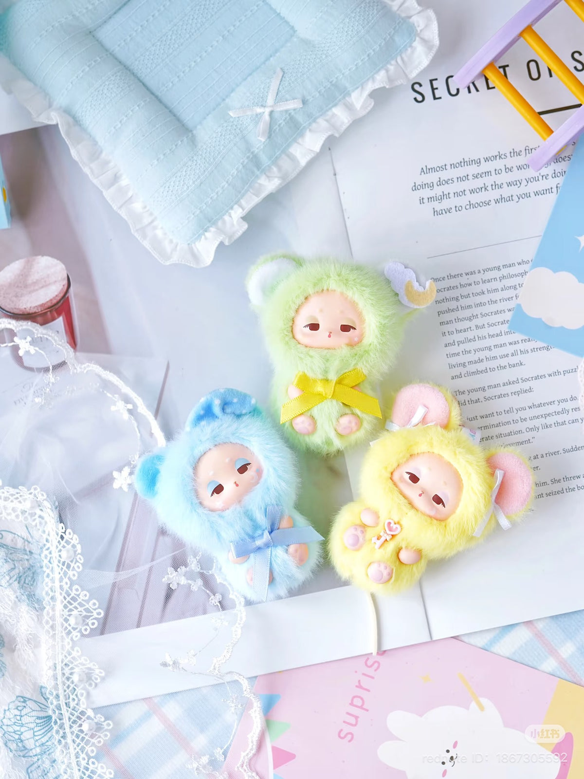Sleepy Baby series vinyl plush keychain blind box featuring a close-up of whimsical elements like a heart and ladder, highlighting its playful, collectible nature. Preorder available.
