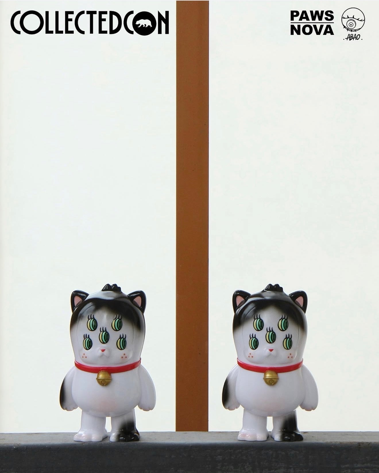 CollectedCon Abao Beans Exclusive preorder features two identical 5-inch vinyl lucky cat figures with six green eyes, red collars, and gold bells. Ships May 2026.