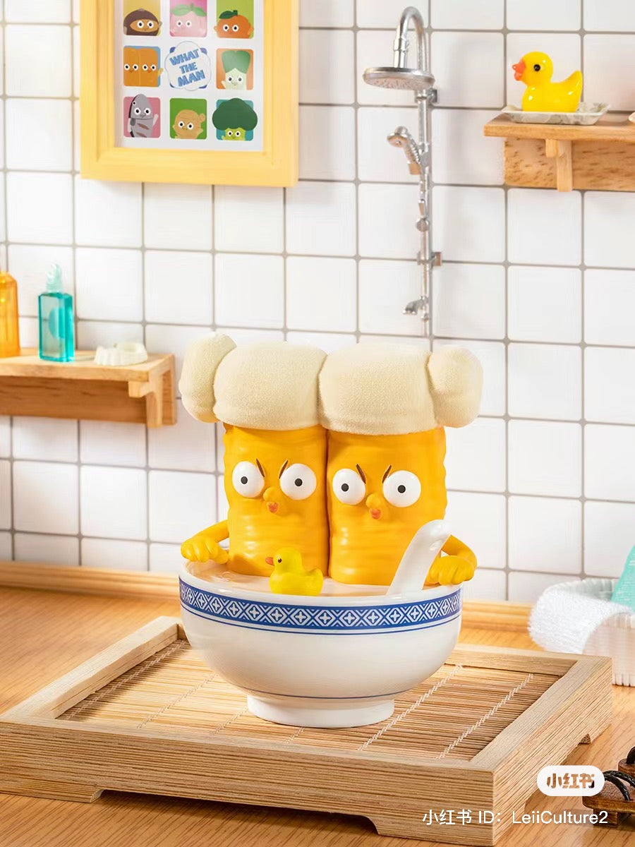 What the Man Daily Blind Box Series toy corn, rubber duck, cartoon characters, and more in various settings.