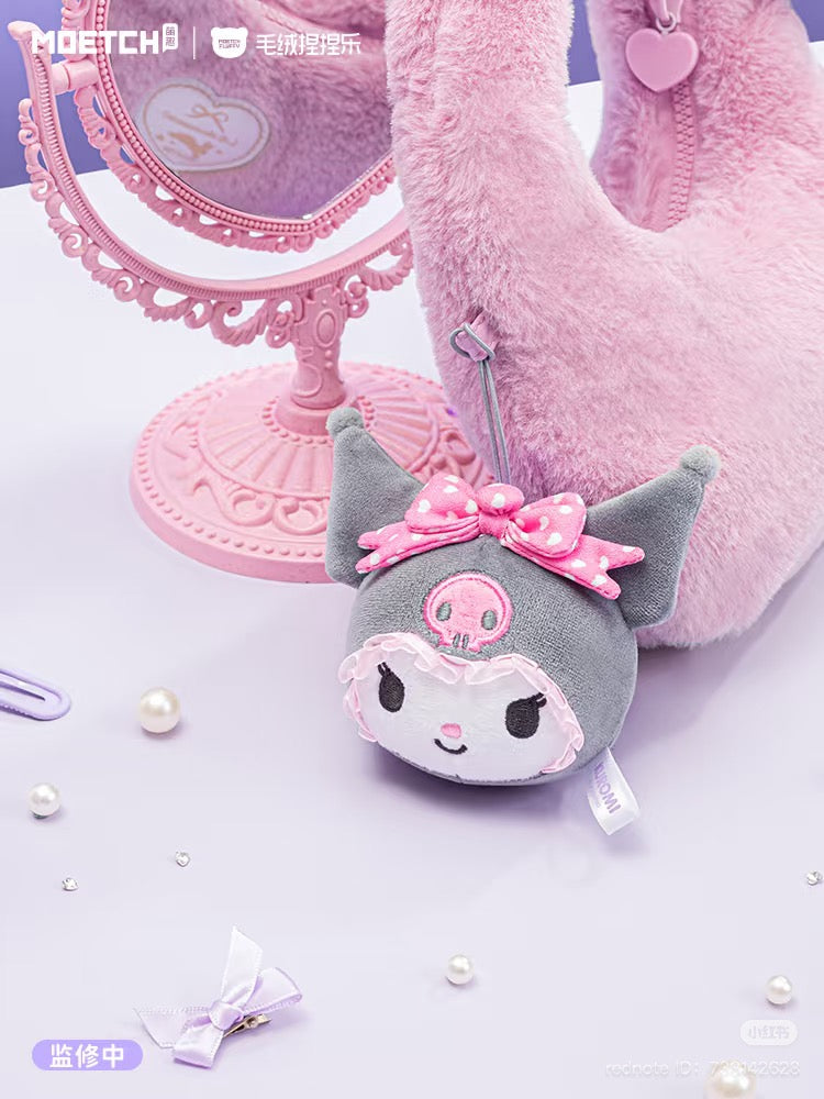 Kuromi Girl's Hair Accessories Series Plush keychain featuring a pink bow, displayed next to a pink mirror.
