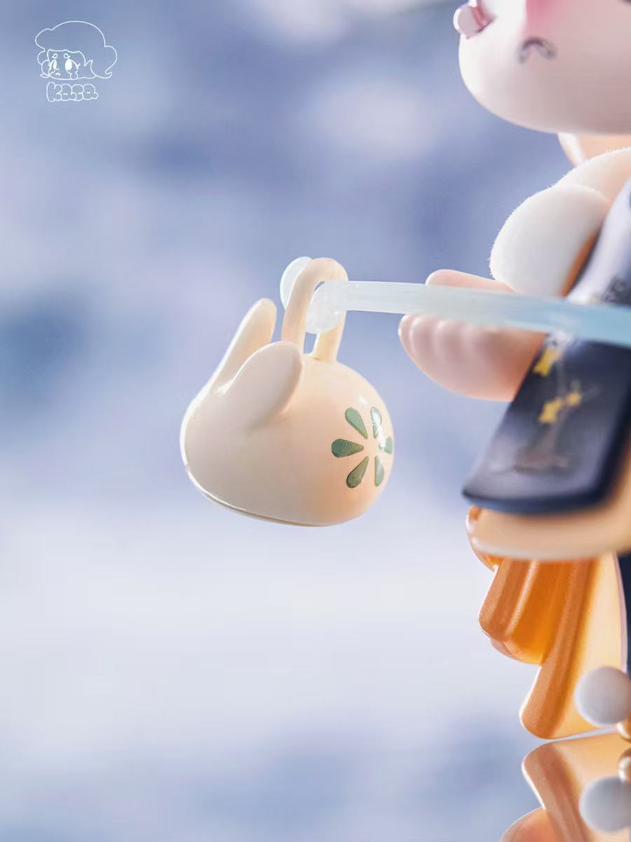 Chibi figurine from KASA 2.0 - Mystic Tales Blind Box, holding a rabbit-head handbag with ear handles and green flower graphic.