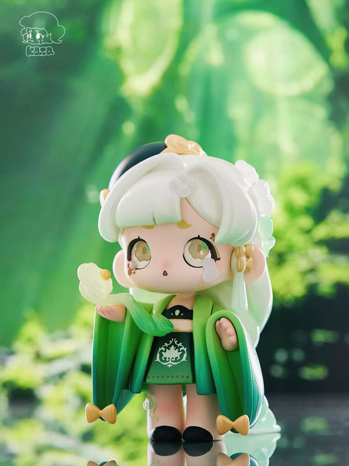 KASA 2.0 - Mystic Tales Blind Box Series: Chibi figure in a kimono, holding a translucent flower, with floral eyes and mint hair.