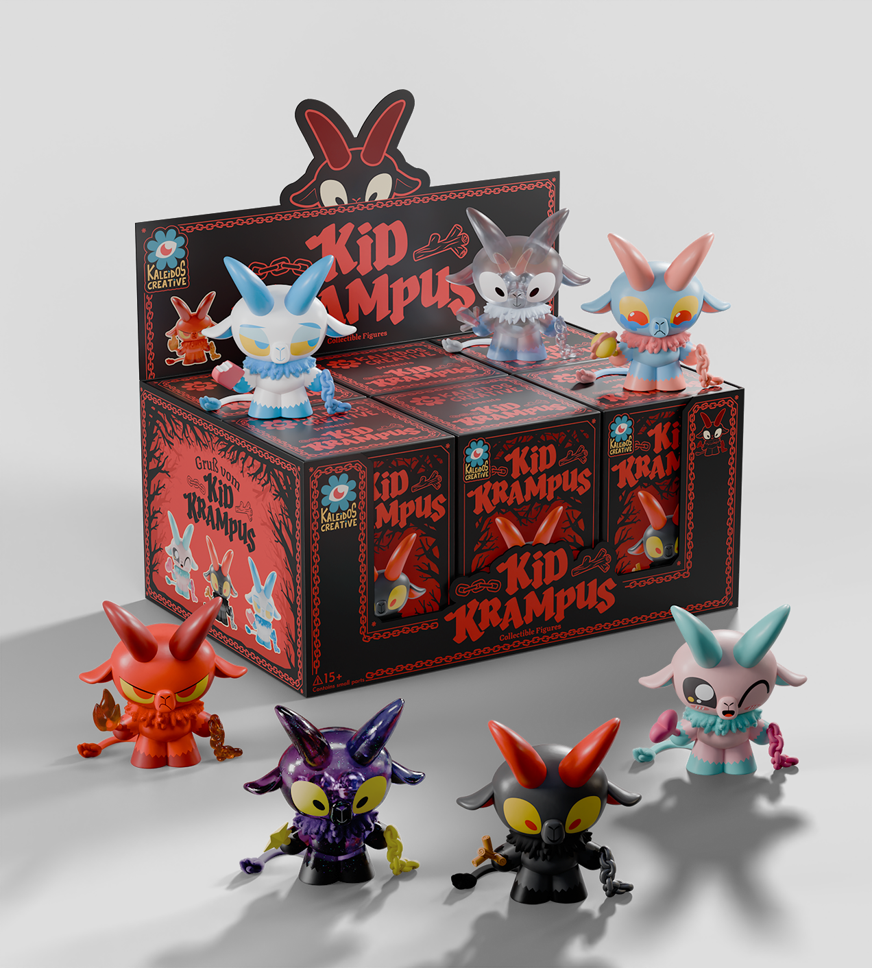 Kid Krampus Blind Box display featuring stylized horned figures with chains and tridents, showcasing collectible vinyl toys from Kaleidos Creative at Strangecat Toys.