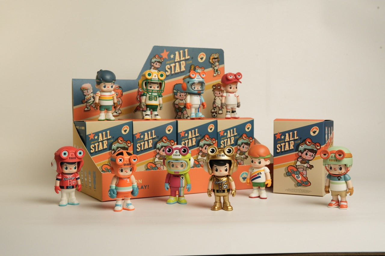 OWANGEBOY-All Stars Sports Blind Box Series featuring colorful collectible figurines in sporty outfits with whimsical helmets, displayed with branded packaging.