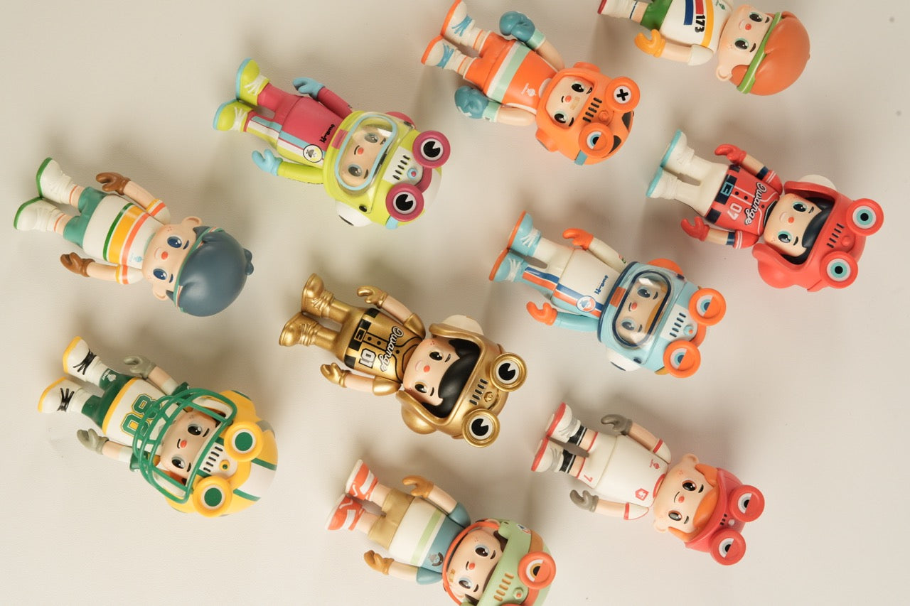 OWANGEBOY-All Stars Sports Blind Box Series featuring ten colorful, cartoon-style figurines with helmet-like headpieces, gloves, and boots, ideal for collectors of designer art toys.