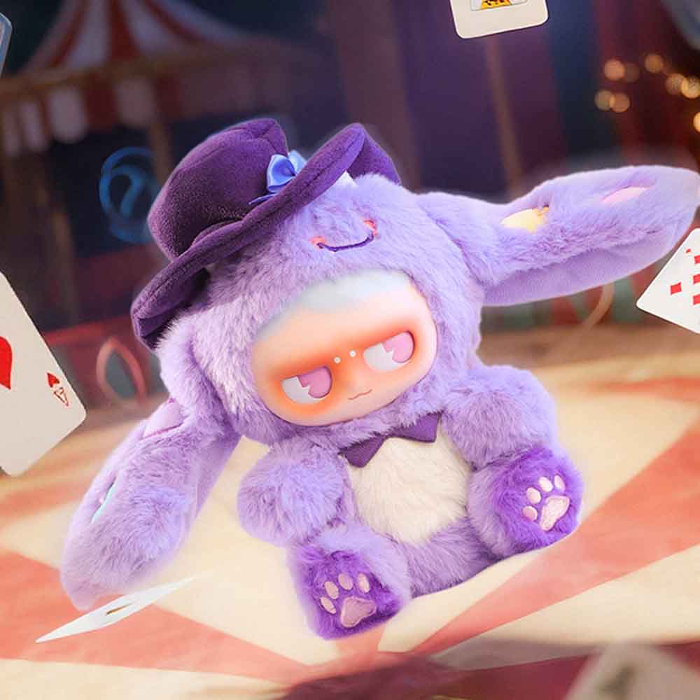 MONBOO-Monster Paradise Series Plush Blind Box features a whimsical lavender bunny plush with a top hat and bow tie, surrounded by floating playing cards.