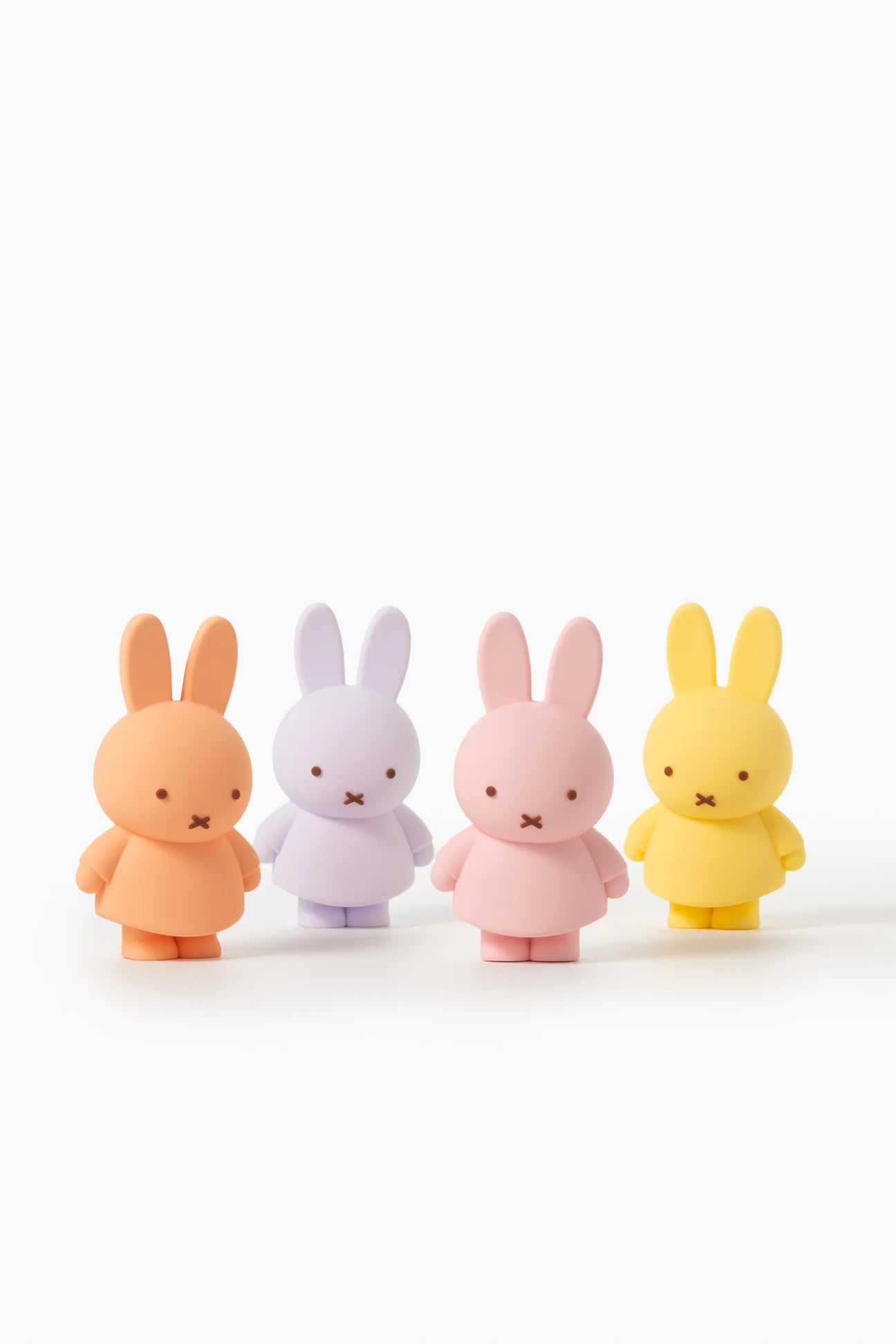 Smoko Miffy Goes Pastel Blind Box Figure features four small, rounded bunny figures in pastel colors, perfect as collectible vinyl toys.