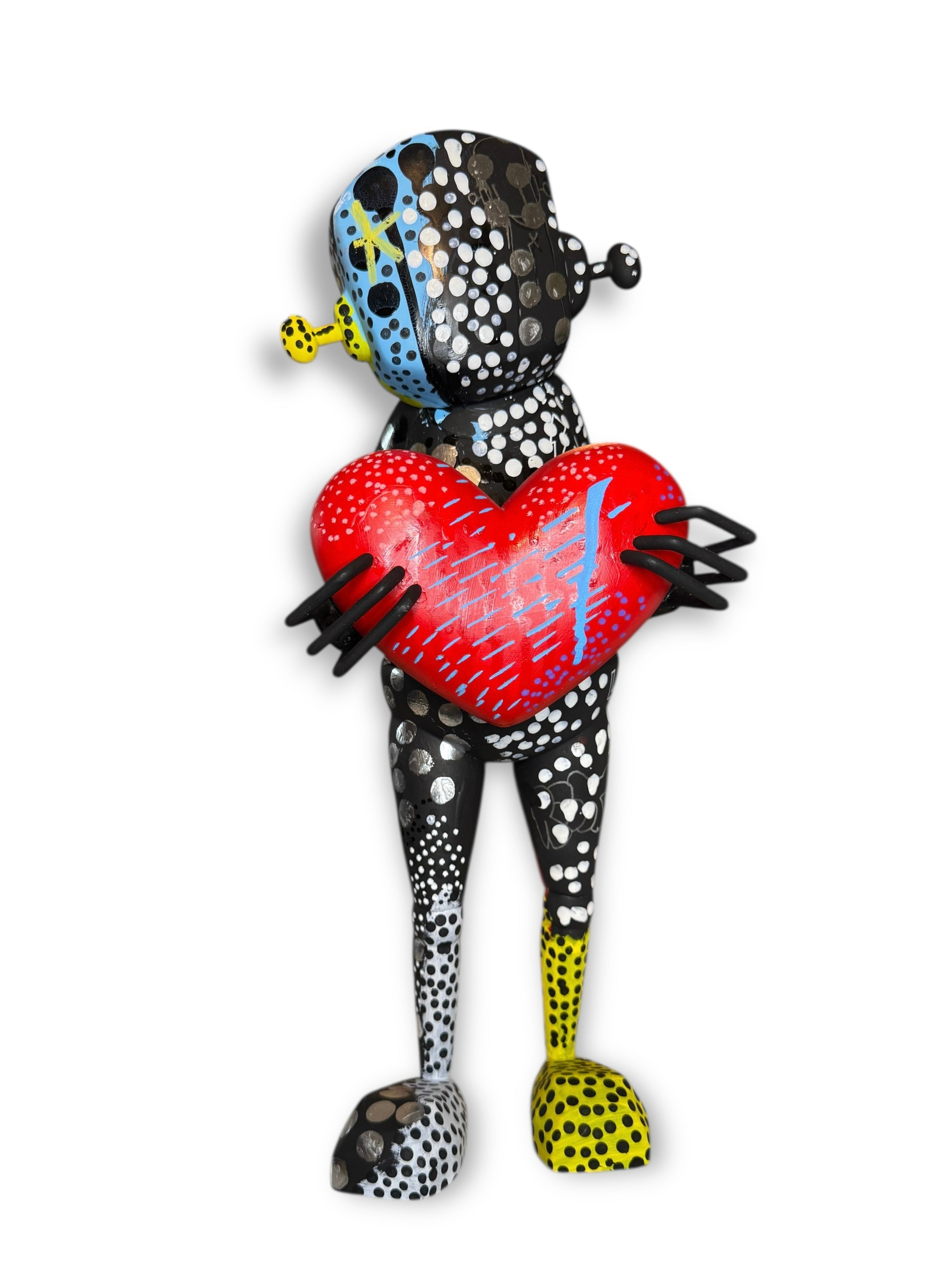 Time Will Tell - 'Pop' by Chris RWK: A 15-inch polka-dotted robot sculpture holding a red heart, blending playful and contemporary art styles.