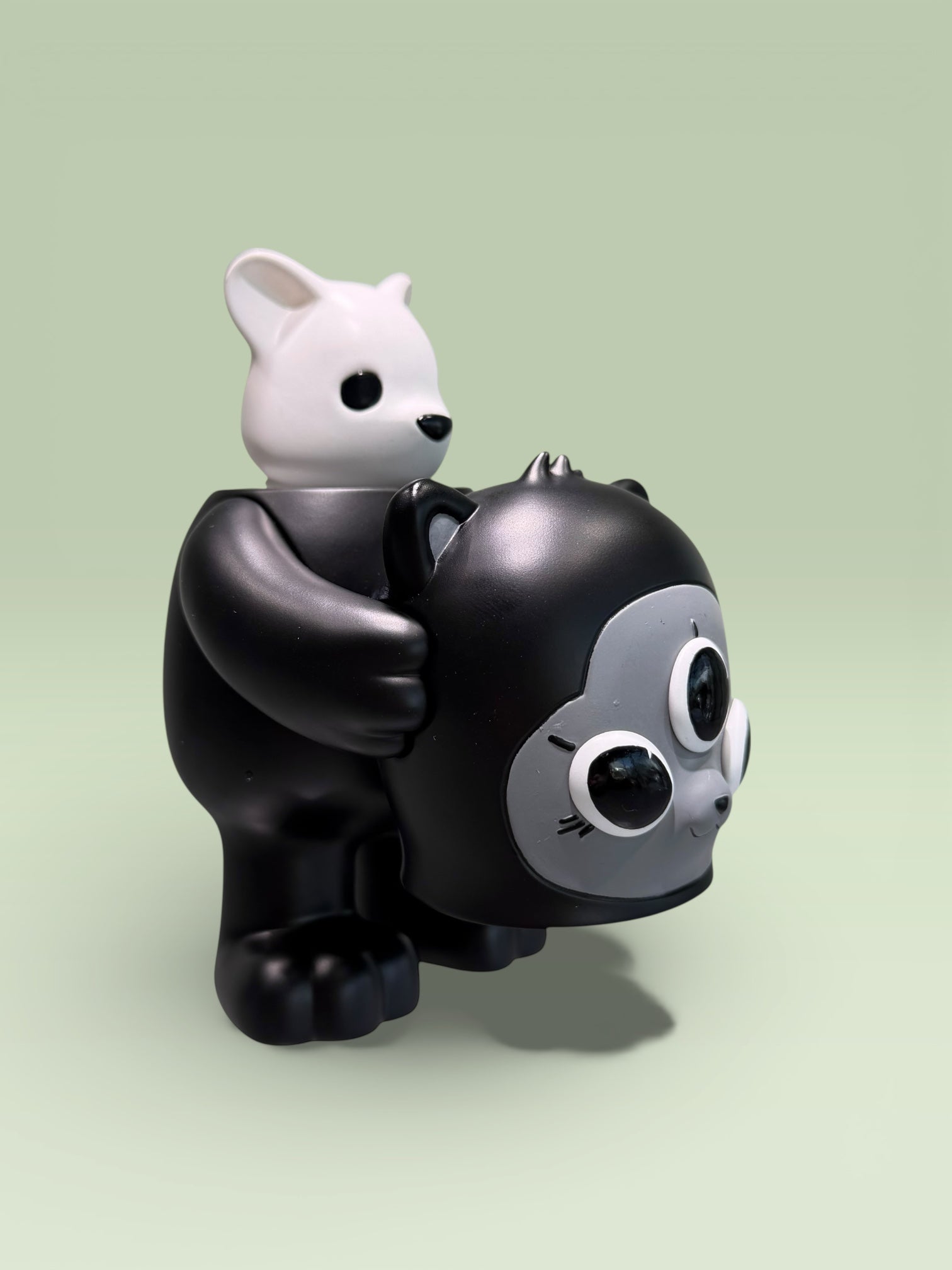 CollectedCon Luke Chueh Beans Exclusive features a 5 resin toy with a stacked rabbit and black creature design. Limited edition of 50 pieces. Preorder available.