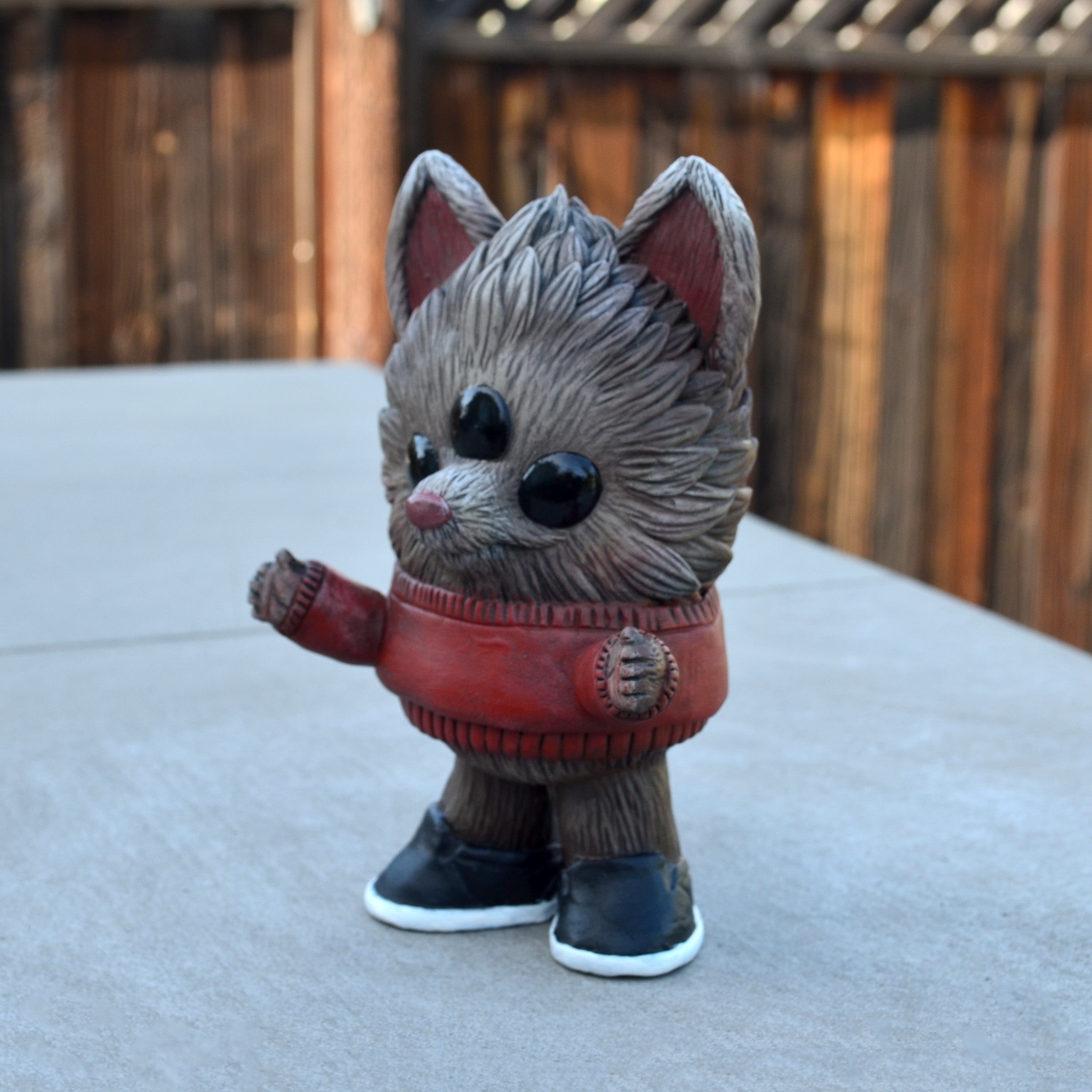 Beans Group Show - Reynard by Vanessa Ramirez x Josh Divine: a 4in vinyl cat figurine in a red sweater and sneakers, preorder for May 2026.