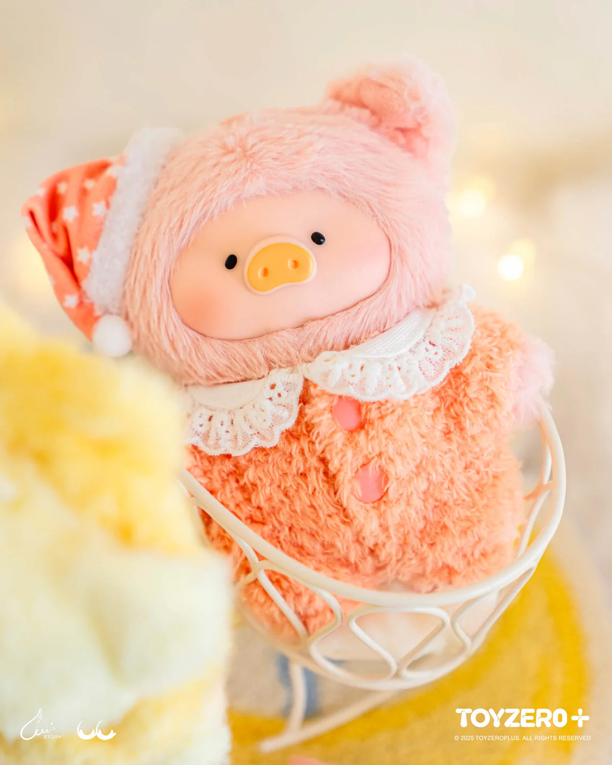 LuLu the Piggy plush keychain in a festive outfit, nestled in a basket, part of the Dreaming Wonderland Series by TOYZERO+.