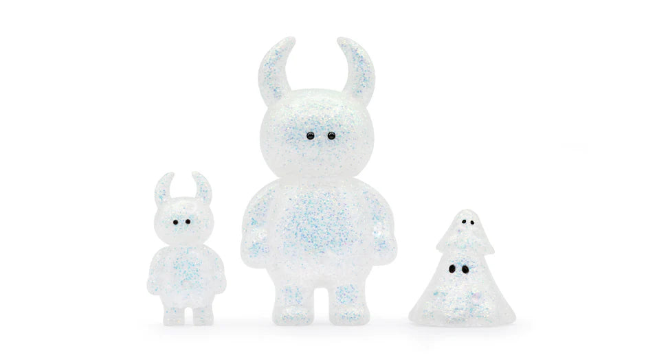 UAMOU WHITE OPAL figures: three glittery, translucent collectibles, featuring two horned figures and one tree-like shape, crafted from soft vinyl, 7cm tall.
