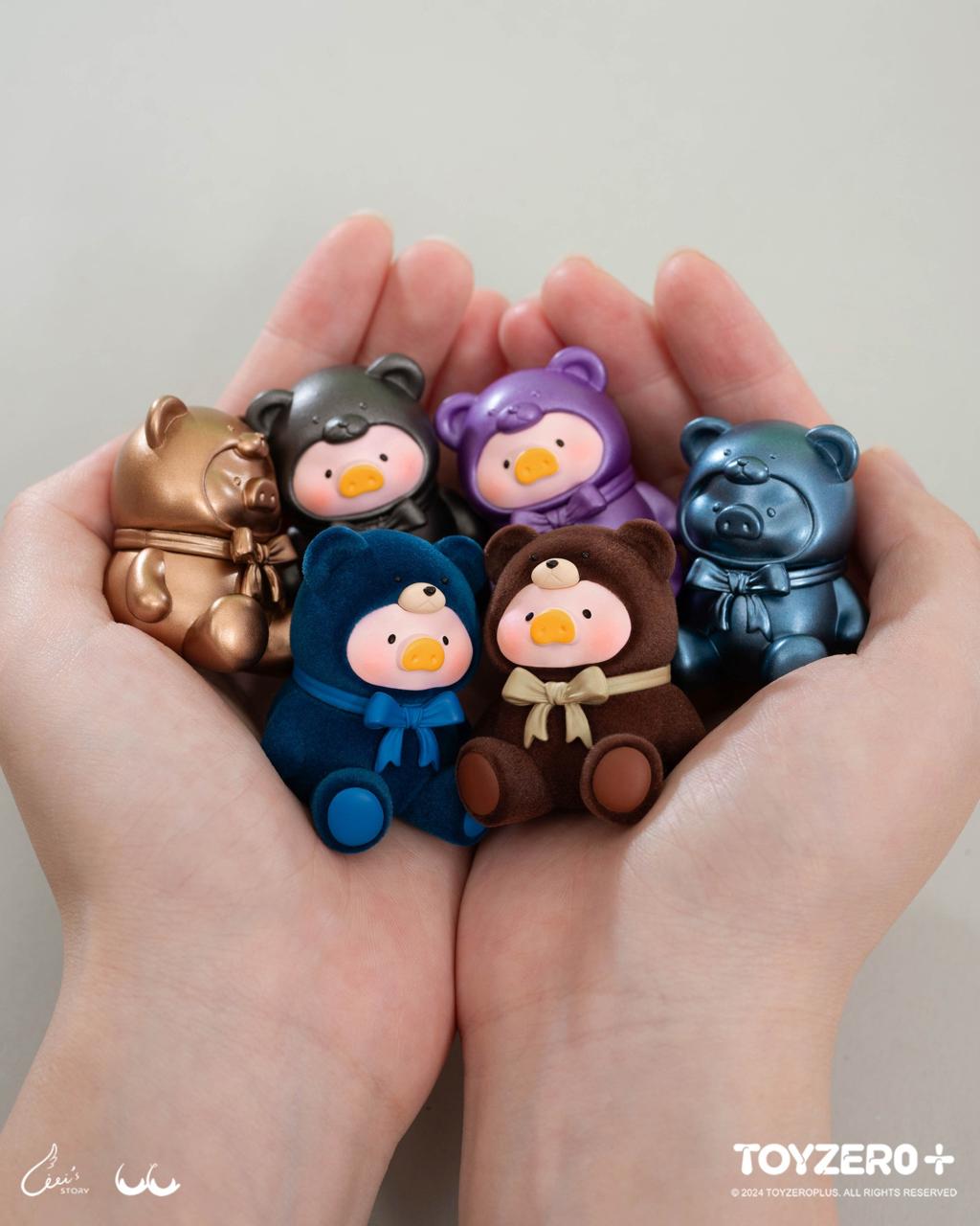 LuLu the Piggy Teddy MINI held in hands, showcasing its intricate craft as part of a collectible blind bag series.