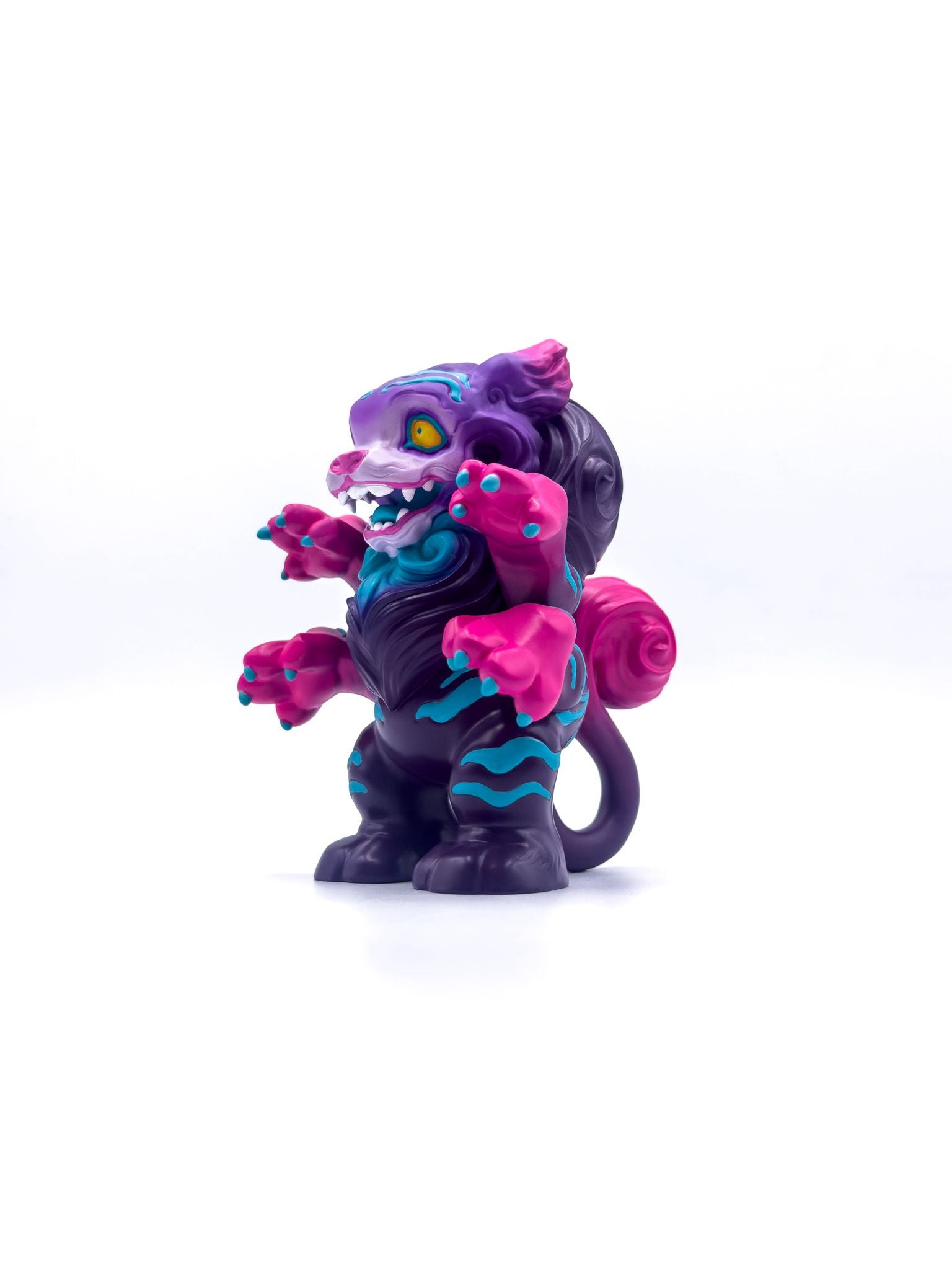 Hikaru - The Radiant by Tomodachi Island, a 13cm vinyl toy, features UV-reactive details, four arms, a detachable tail, and a unique snarling face.
