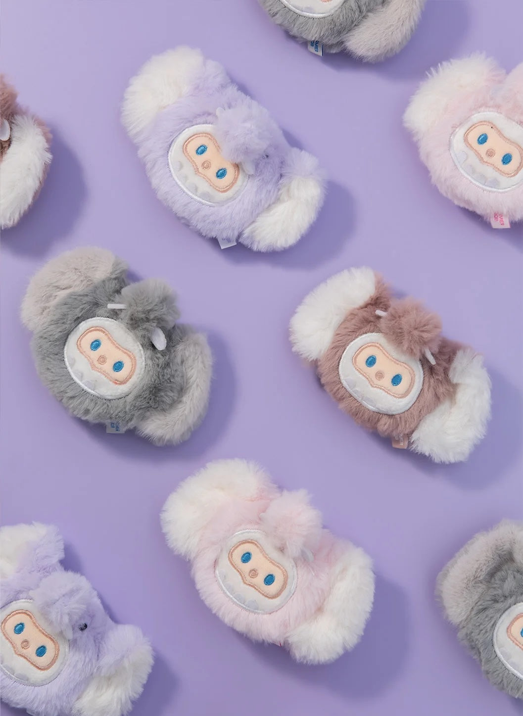 FINDING UNICORN Furry Fridge Magnet Blind Box features fluffy earmuff magnets with cartoon faces and pom-poms, showcasing playful design elements.