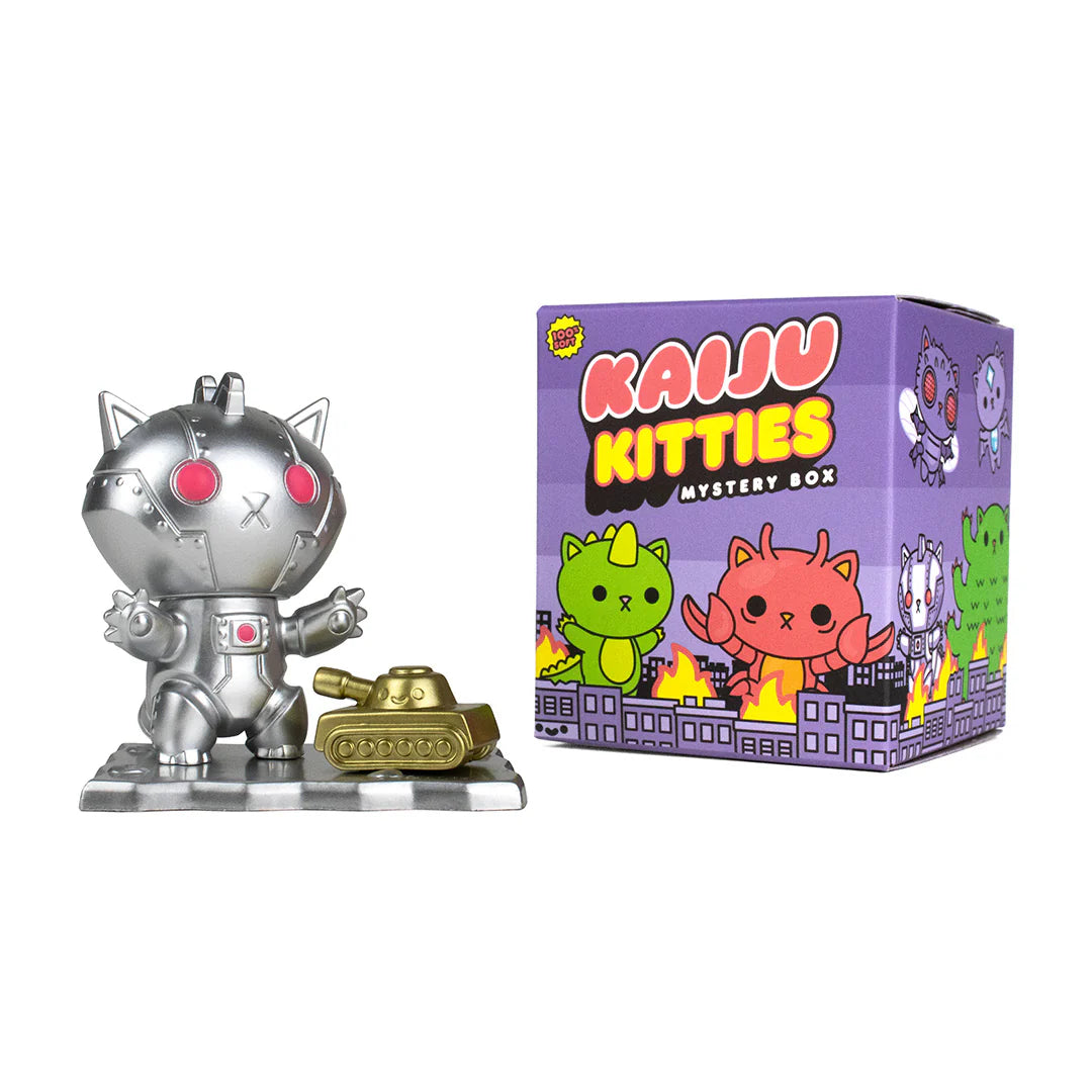 Kaiju Kitties Mystery Box Series 1 by 100% Soft - Preorder: Silver robot toy with tank, gold tank toy, and cartoon cat figures. Blind box art toy store product.