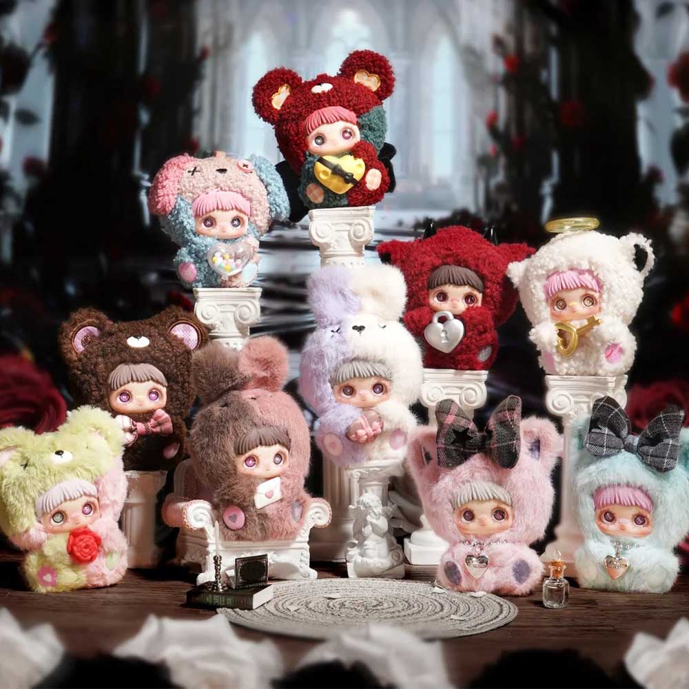 MayMei May I Love You Plush Keychain Blind Box dolls in animal onesies, arranged with accessories on plinths, against a rose backdrop. Preorder for November 2025.