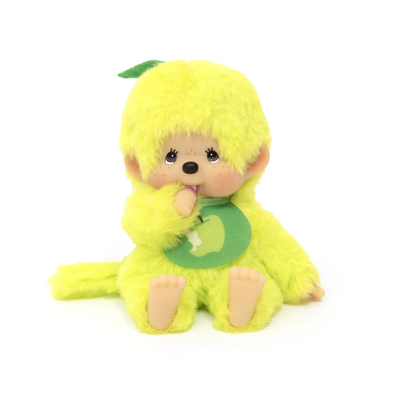 Monchhichi Fruit Beanies Plush, a 5.5 thumb-sucking monkey toy in a lime-green outfit with an apple emblem, sitting with its thumb in its mouth.