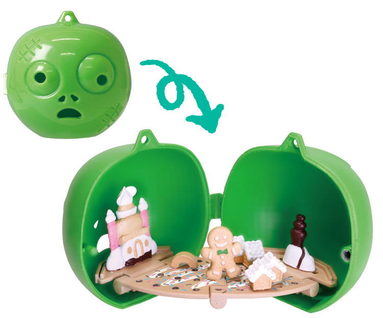 2-Way Halloween Ornament Gacha Series featuring a zombie head pod with a gingerbread diorama inside, including figurines and festive elements.