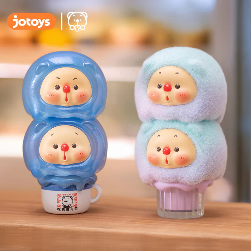 OYO Ice Cream Jenga Blind Box Series featuring two toy dolls, part of a collection with 8 regular designs and 2 secrets, displayed on a table.