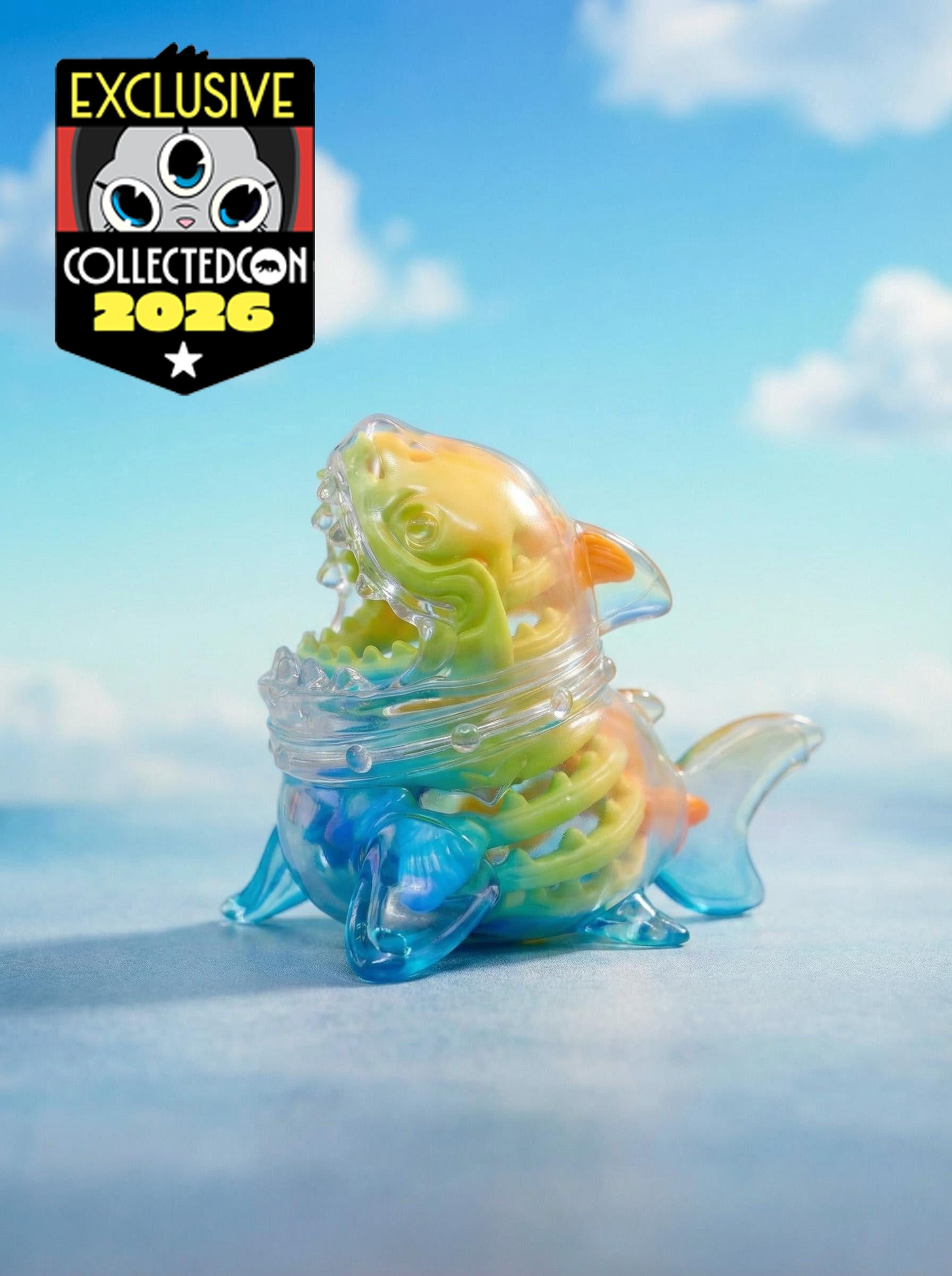 Rainbow Shark by HOTRU: A collectible vinyl toy with a clear shell, revealing a pastel skeleton. Convention-exclusive, featuring the removable cat inside.