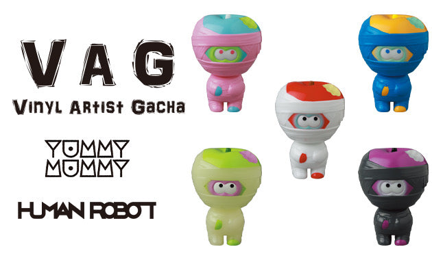 VAG 36 - Yummy Mummy vinyl toy figurines: group of small plastic toys including a ninja, mummy, and more.