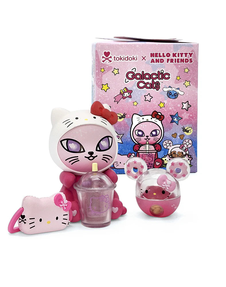 Tokidoki Galactic Cats x Hello Kitty & Friends Blind Box featuring a pink cat figure with accessories: purse, bubble-tea cup, and capsule toy, against themed packaging.